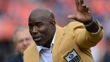 DENVER, CO - NOVEMBER 19: Former Denver Broncos running back and hall of fame inductee Terrell Davis stands on the field with his family during a ceremony to recognize the former player before a game between the Denver Broncos and the Cincinnati Bengals at Sports Authority Field at Mile High on November 19, 2017 in Denver, Colorado. (Photo by Dustin Bradford/Getty Images)
